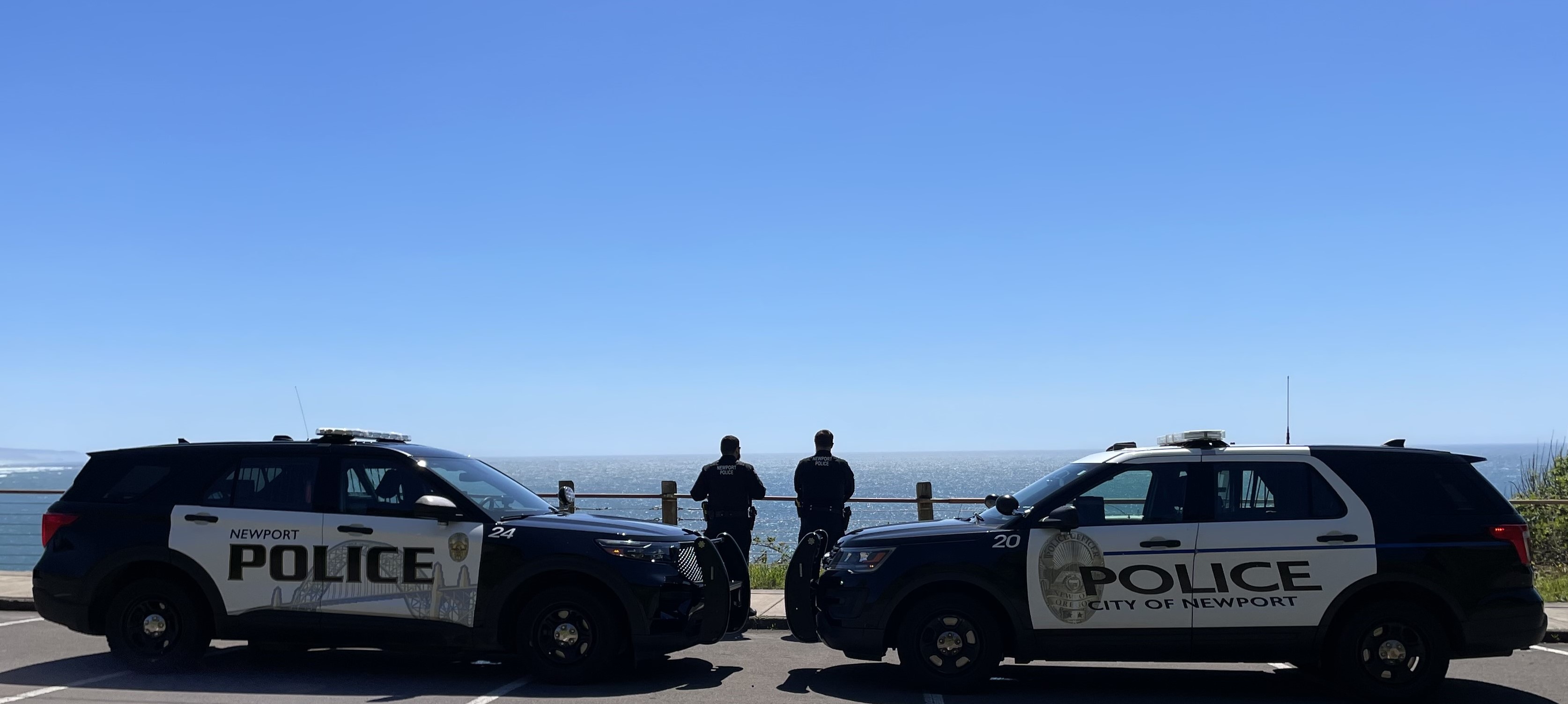 Two Patrol Officers and their vehicles